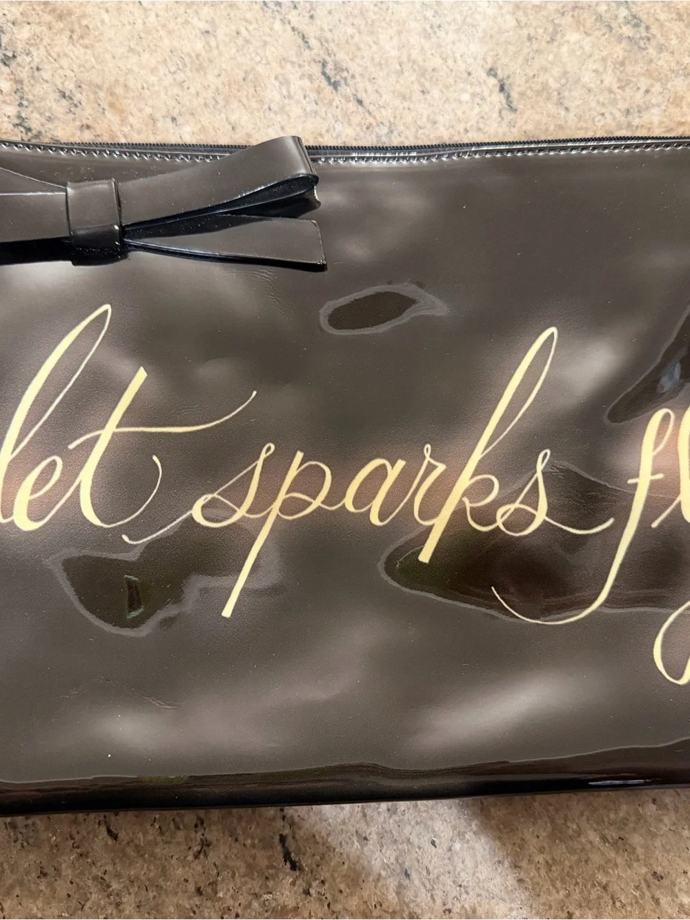 Kate Spade Black Patent Bow Clutch with Gold Script